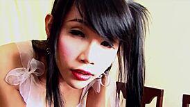 ladyboy yoko teases while stroking her uncut thai dick