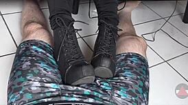 Milf rests boots on my cock and balls teasing intensely