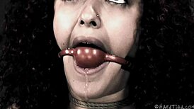 Mixed Girl Experiences Intense Bondage With Caning And Fisting