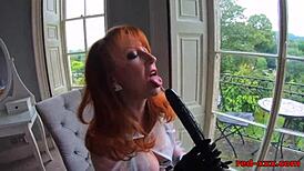 I can't get enough of my big black dildo as a sexy mature redhead.