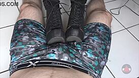 Milf rests boots on my cock and balls teasing intensely