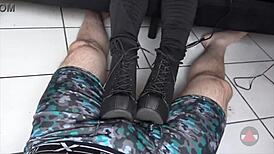 Milf rests boots on my cock and balls teasing intensely
