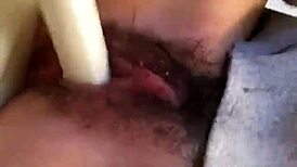 Wow, check this Japanese girl rubbing her hairy pussy up close 'til she squirts!