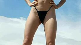 Kiara Meow teases with wet, naked body on a sexy beach workout