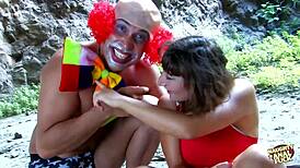 Clown-Dressed Guy Drills Brunette in Wild Outdoor Anal Adventure