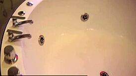 teen babe in jacuzzi uses dildo for hotel fun