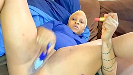 she's alone, stroking her big tits and ass in a hardcore solo session