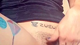 Woman with huge pussy lips shows off hairy goth tits and masturbates