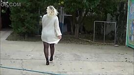 Why does this nylon big ass woman tease outdoors?