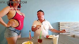 Naked Waitress Serves Guest from Her Navel