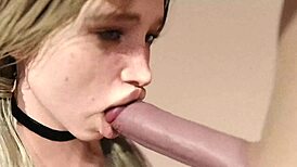 blonde girl enjoys a big white treat