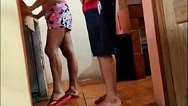 This lustful mature woman watches her stepson arrive. She urges him to touch her curvy ass.