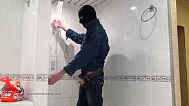 Master In Blue Jeans Washes Feet In Bathroom