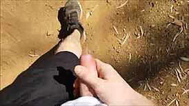 guy jerks off in the bush outdoors