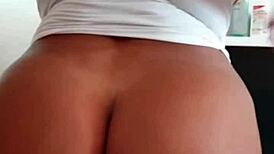 Watch her ride that huge cock on the table, moaning in orgasm.