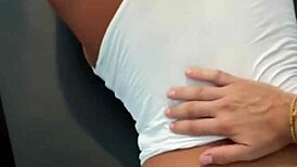 Watch her ride that huge cock on the table, moaning in orgasm.