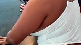 Watch her ride that huge cock on the table, moaning in orgasm.