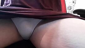 Exhibitionist Transsexual Reveals Massive Cock Beneath Desk