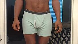 In this workout session, a cute mature woman barefoot in stockings performs solo exercises