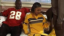 ebony cheerleaders get cum on face in group scene