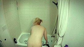 Annie Archer, pawg star, takes a steamy shower showing big ass and tits.