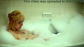 Annie Archer, pawg star, takes a steamy shower showing big ass and tits.