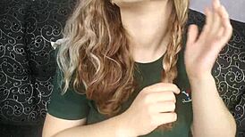 Close-up of oiled feet in homemade video