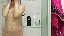 hid the phone in the shower to catch my stepmother’s sexy redhead body.
