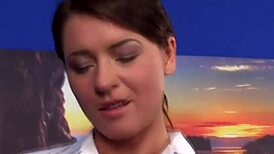 Uniformed masseuse babe gives horny massage to clothed brunette