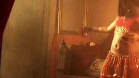 Stunning brunette seductive belly dance performance