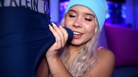 Horny blonde with a cute face stimulates her boyfriend's cock with her boxers on!