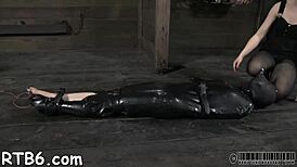 Watch this sweet beauty get tossed into a cage with another horny playgirl for rough domination and sucking.