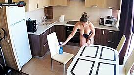 Big Tits Beauty with Pierced Nipples Cleaning Kitchen Topless