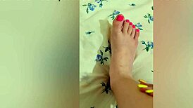 young babe strokes her sexy feet with pink pedicure, reaching luxury orgasm