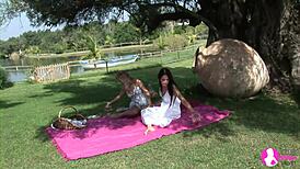 Beautiful women have sex in the garden in this Viv Thomas porn video.