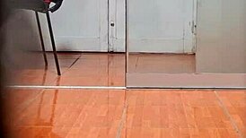 Hidden cam catches the secretary in her office routine