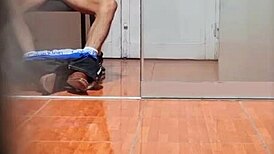 Hidden cam catches the secretary in her office routine