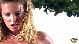 Pretty blonde enjoys the sun and gets her pussy licked and sucks cock on the beach