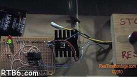 i dominate the caged hotty licking balls and sucking cock