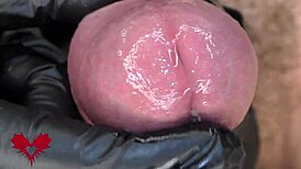 Extreme Close-Up Frontal View with Latex Gloves and Peehole Cumshot