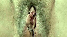 Intensely stroking hairy pussy solo with big black cock until cum