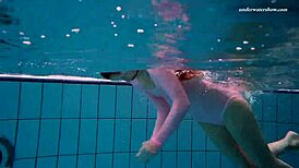 Petite Liza’s underwater shower scene is steamy and sensual.