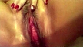 In the bath, the milf relaxes with some soothing masturbation under the water.