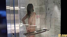smalltitted tranny showering under the camera's gaze