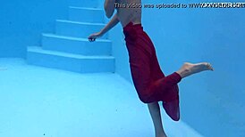 Petite brunette swims in the pool and enjoys sensual pleasures.