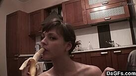 Dagfs freckled babe teases with dildo on kitchen counter