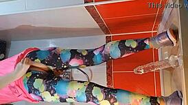 pee and close-up dildo masturbation in the gym shower