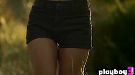 Anetta Keys, a natural small-tits MILF, reveals her stunning body while posing outdoors in nature.