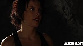 Two Bound Busty Lesbian Slaves Endure Harsh Whipping in Garage