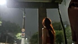 Risky public masturbation for hot redhead at bus stop